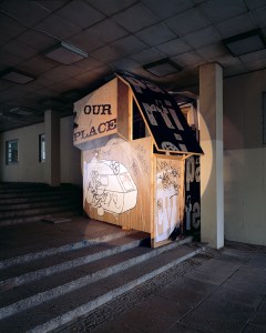 Daniela Brahm Recycling Utopia, 2006 a hut in a public passageway build out of the paintings remaining from the installation "The New Town" in Zamosc, approx. 3.3 x 3.5 x 2.5m