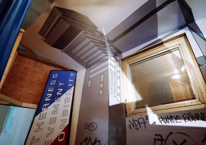 Daniela Brahm Recycling Utopia, 2006 a hut in a public passageway build out of the paintings remaining from the installation "The New Town" in Zamosc, view inside